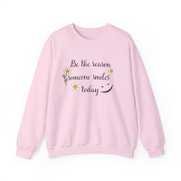 Sweatshirt with 'Be the reason someone smiles today' Quote