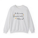 Sweatshirt with 'Be the reason someone smiles today' Quote